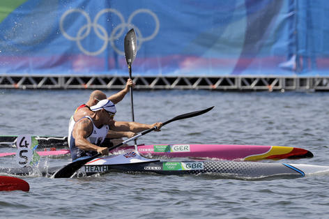 Britain's Liam Heath paddles in the men's kayak single 200m semifinal during the 2016 Summer Olympics in Rio de Janeiro, Brazil, Friday, Aug. 19, 2016. (AP Photo/Andre Penner)