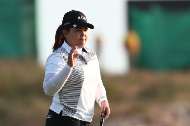 Aug 19, 2016; Rio de Janeiro, Brazil; Inbee Park (KOR) after putting on the 18th green during the third round of the women's golf tournament in the Rio 2016 Summer Olympic Games at Olympic Golf Course. Mandatory Credit: Rob Schumacher-USA TODAY Sports