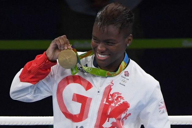Great Britain's Nicola Adams poses on the podium with a gold medal during the Rio 2016 Olympic Games at the Riocentro - Pavilion 6 in Rio de Janeiro on August 20, 2016.   / AFP / GOH Chai Hin        (Photo credit should read GOH CHAI HIN/AFP/Getty Images)