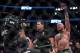 Aug 20, 2016; Las Vegas, NV, USA; Conor McGregor (blue gloves) reacts to fight with Nate Diaz (red gloves) during UFC 202 at T-Mobile Arena. Mandatory Credit: Joshua Dahl-USA TODAY Sports
