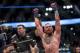Aug 20, 2016; Las Vegas, NV, USA; Conor McGregor (blue gloves) reacts to fight with Nate Diaz (red gloves) during UFC 202 at T-Mobile Arena. Mandatory Credit: Joshua Dahl-USA TODAY Sports