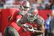 Dec 27, 2015; Tampa, FL, USA; Tampa Bay Buccaneers running back Doug Martin (22) takes a handoff from Tampa Bay Buccaneers quarterback Jameis Winston during the second half of a football game at Raymond James Stadium. The Bears won 26-12. Mandatory Credit: Reinhold Matay-USA TODAY Sports