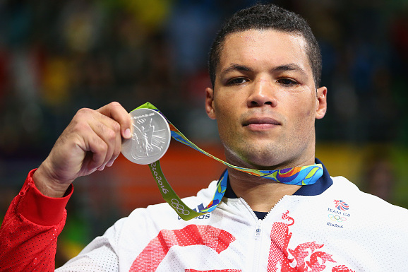 RIO DE JANEIRO, BRAZIL - AUGUST 21:  Silver medalist Joe Joyce of Great Britain poses on the podium during the medal ceremony for the Men's Boxing Super Heavy (+91kg) on Day 16 of the Rio 2016 Olympic Games at Riocentro - Pavilion 6 on August 21, 2016 in Rio de Janeiro, Brazil.  (Photo by Alex Livesey/Getty Images)
