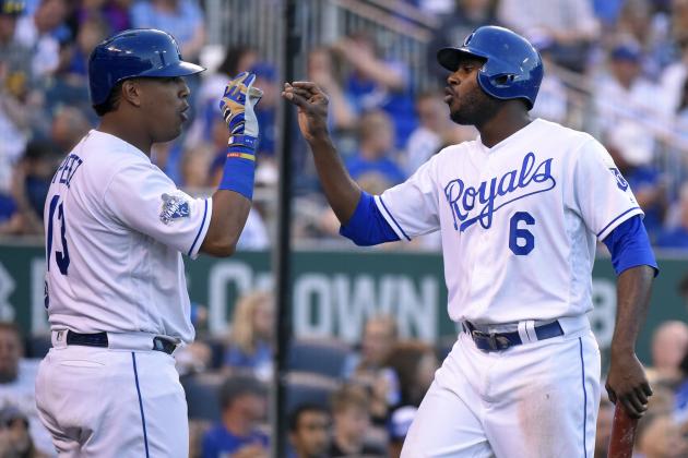 KANSAS CITY, MO - AUGUST 20:  Lorenzo Cain #6 of the Kansas City Royals celebrates with Salvador Perez #13 after scoring on a Eric Hosmer #35 single in the fifth inning against the Minnesota Twins Kauffman Stadium on August 20, 2016 in Kansas City, Missouri. (Photo by Ed Zurga/Getty Images)