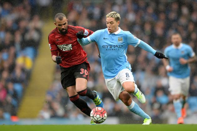 MANCHESTER, ENGLAND - APRIL 09:  Samir Nasri of Manchester City and Sandro of West Bromwich Albion compete for the ball during the Barclays Premier League match between Manchester City and West Bromwich Albion at the Etihad Stadium on April 9, 2016 in Manchester, England.  (Photo by Gareth Copley/Getty Images)