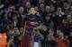 Barcelona's Gerard Pique celebrates scoring his side's first goal during a Spanish La Liga soccer match between Barcelona and Real Madrid, dubbed 'el clasico', at the Camp Nou stadium in Barcelona, Spain, Saturday, April 2, 2016. (AP Photo/Emilio Morenatti)