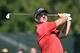 Patrick Reed watches his tees hot from the third hole during the final round of The Barclays golf tournament in Farmingdale, N.Y., Sunday, Aug. 28, 2016. (AP Photo/Kathy Kmonicek)