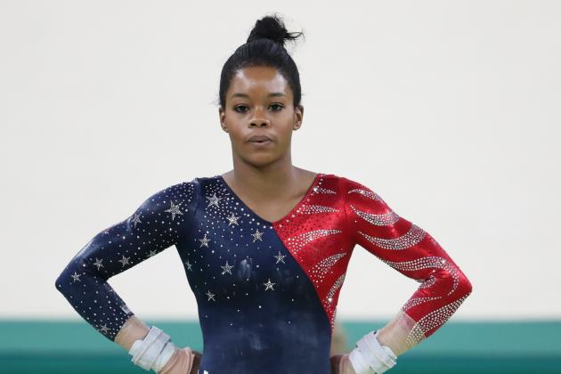Aug 7, 2016; Rio de Janeiro, Brazil; Gabby Douglas (USA) on the uneven bars during women's gymnastic qualifications in the Rio 2016 Summer Olympic Games at Rio Olympic Arena. Mandatory Credit: Geoff Burke-USA TODAY Sports