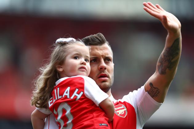 LONDON, UNITED KINGDOM - MAY 15: Jack Wilshere of Arsenal holding his child applauds supporters the Barclays Premier League match between Arsenal and Aston Villa at Emirates Stadium on May 15, 2016 in London, England.  (Photo by Julian Finney/Getty Images)