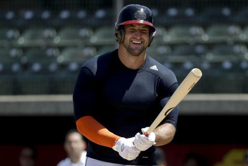 Tim Tebow still a hit with fans but not with the bat