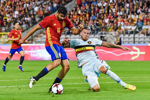 Belgium's Toby Alderweireld, right, tackles Spain's Diego Costa during a friendly soccer match at the King Baudouin stadium in Brussels on Thursday, Sept. 1, 2016. (AP Photo/Geert Vanden Wijngaert)