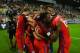 TRNAVA, SLOVAKIA - SEPTEMBER 04: Adam Lallana of England (obscured) celebrates with team mates as he scores their first goal during the 2018 FIFA World Cup Group F qualifying match between Slovakia and England at City Arena on September 4, 2016 in Trnava, Slovakia. (Photo by Dan Mullan/Getty Images)