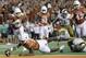 AUSTIN, TX - SEPTEMBER 04: (EDITORS NOTE: Retransmission with alternate crop.) Tyrone Swoopes #18 of the Texas Longhorns dives for the game-winning touchdown in the second overtime against the Notre Dame Fighting Irish at Darrell K. Royal-Texas Memorial Stadium on September 4, 2016 in Austin, Texas. (Photo by Ronald Martinez/Getty Images)