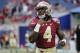 Sep 5, 2016; Orlando, FL, USA; Florida State Seminoles running back Dalvin Cook (4) works out before a game against the Mississippi Rebels at Camping World Stadium. Mandatory Credit: Kim Klement-USA TODAY Sports