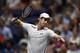 Andy Murray slams his racket in frustration after losing a game in his quarterfinals match at the 2016 U.S. Open.