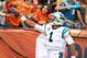Sep 8, 2016; Denver, CO, USA; Carolina Panthers quarterback Cam Newton celebrates by giving a touchdown ball to a young fan in the first quarter against the Denver Broncos at Sports Authority Field at Mile High. Mandatory Credit: Mark J. Rebilas-USA TODAY Sports