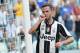 Juventus' Miralem Pjanic celebrates after scoring during a Serie A soccer match between Juventus and Sassuolo at the Juventus Stadium in Turin, Italy, Saturday, Sept. 10, 2016. (Alessandro Di Marco/ANSA via AP)