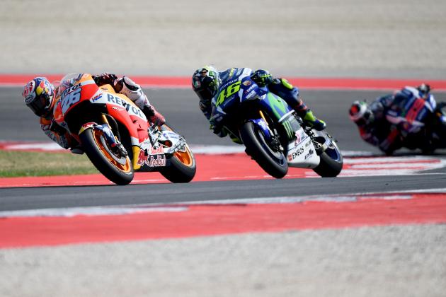 (LtoR) Repsol Honda Team's Spanish rider Dani Pedrosa leads ahead of Movistar Yamaha MotoGP's Italian rider Valentino Rossi and Movistar Yamaha MotoGP's Spanish rider Jorge Lorenzo during the San Marino Moto GP Grand Prix race at the Marco Simoncelli Circuit in Misano, on September 11, 2016. / AFP / GABRIEL BOUYS        (Photo credit should read GABRIEL BOUYS/AFP/Getty Images)