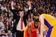 LOS ANGELES, CA - APRIL 17: Head Coach Mike D'Antoni of the Los Angeles Lakers directs his team as James Harden #13 of the Houston Rockets controls the ball against Pau Gasol #16 of the Lakers at Staples Center on April 17, 2013 in Los Angeles, California. NOTE TO USER: User expressly acknowledges and agrees that, by downloading and/or using this Photograph, user is consenting to the terms and conditions of the Getty Images License Agreement. Mandatory Copyright Notice: Copyright 2013 NBAE (Photo by Andrew D. Bernstein/NBAE via Getty Images)