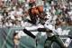 Cincinnati Bengals' A.J. Green (18) catches a pass in front of New York Jets' Darrelle Revis (24) during the first half of an NFL football game Sunday, Sept. 11, 2016 in East Rutherford, N.J. Green scored a touchdown on the play. (AP Photo/Kathy Willens)