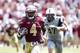 TALLAHASSEE, FL - SEPTEMBER 10: Runningback Dalvin Cook #4 of the Florida State Seminoles on a runs in for a score during the game against the Charleston Southern Buccaneers at Doak Campbell Stadium on Bobby Bowden Field on September 10, 2016 in Tallahassee, Florida. The 3rd ranked Florida State defeated Charleston Southern 52 to 8. (Photo by Don Juan Moore/Getty Images)