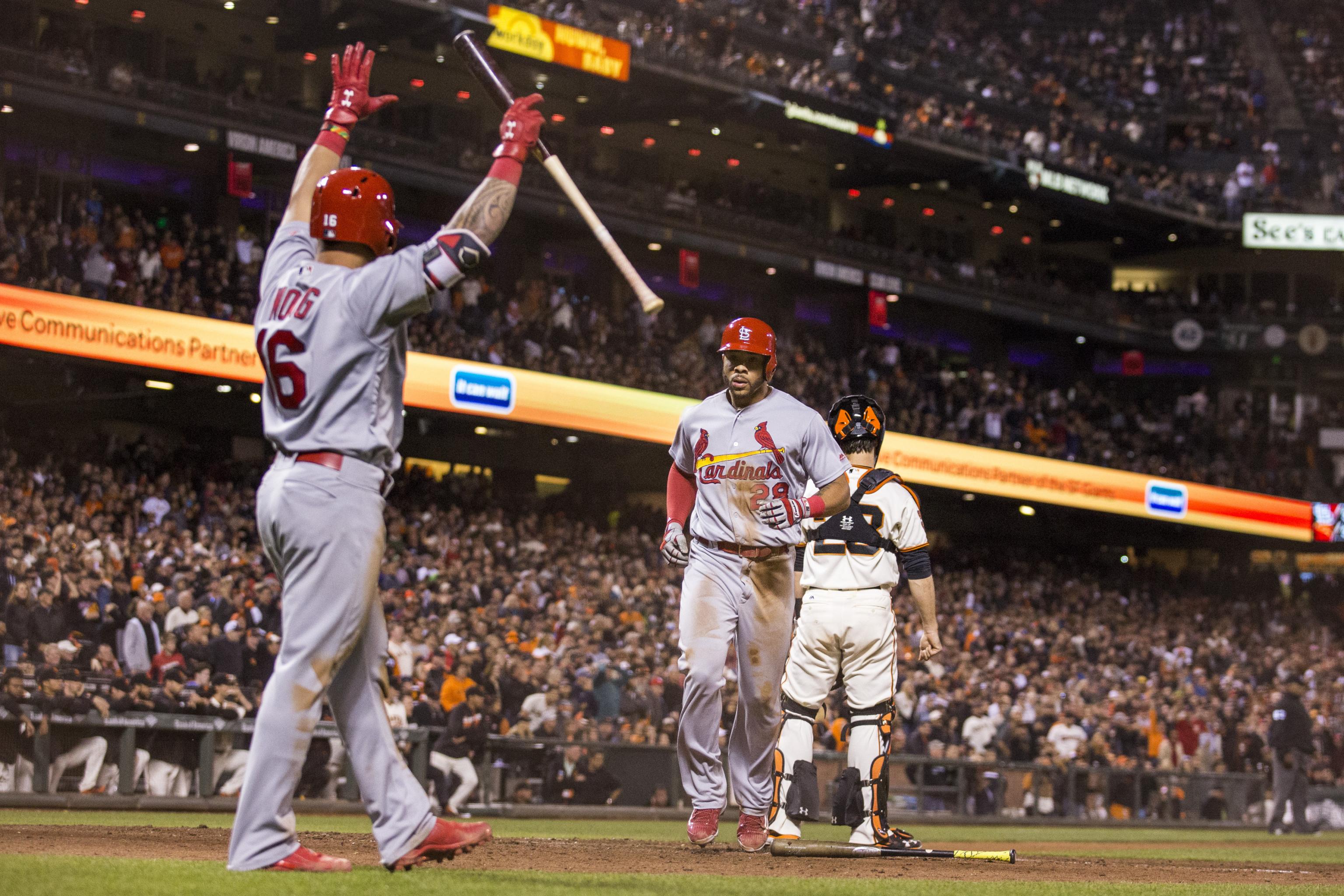 St. Louis Cardinals (L ro R) Aledmys Diaz, Carlos Martines and