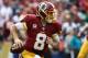 LANDOVER, MD - SEPTEMBER 18: Quarterback Kirk Cousins #8 of the Washington Redskins looks to pass against the Dallas Cowboys in the second quarter at FedExField on September 18, 2016 in Landover, Maryland. (Photo by Rob Carr/Getty Images)