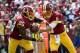 Sep 18, 2016; Landover, MD, USA; Washington Redskins quarterback Kirk Cousins (8) hands the ball off to Redskins running back Chris Thompson (25) against the Dallas Cowboys at FedEx Field. Mandatory Credit: Geoff Burke-USA TODAY Sports