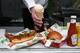 LONDON, ENGLAND - JUNE 02: Pub giant Greene King launches hot dog and burger flavoured ice cream to mark the start of summer long Burger & Hot Dog Festival on June 2, 2016 in London, England. The limited edition flavours will be testing the public's taste buds in city centre locations across London, Cambridge, Oxford, Liverpool and Manchester to see just how adventurous our culinary appetites have become. Pub giant Greene King, which is behind the social experiment, believes savoury ice creams could be the next big food revolution at mainstream restaurants and could be seen alongside the humble cheese board on pub menus up and down the country. (Photo by Stuart C. Wilson/Getty Images for Greene King)