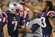 Sep 22, 2016; Foxborough, MA, USA; New England Patriots quarterback Jacoby Brissett (7) is congratulated by defensive end Jabaal Sheard (93) after scoring touchdown against the Houston Texans as head coach Bill Belichick takes the ball from him to save it during the first half at Gillette Stadium. Mandatory Credit: Winslow Townson-USA TODAY Sports