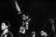 TO GO WITH AFP STORY BY JIM SLATER : 'Forty years after Tommie Smith and John Carlos raised their fists in a civil rights gesture on the Olympic medal stand in Mexico City, protests on the podium could make a comeback in Beijing.'. (FILES) US athletes Tommie Smith (C) and John Carlos (R) raise their gloved fists in the Black Power salute to express their opposition to racism in the USA during the US national anthem, after receiving their medals 17 October 1968 for first and third place in the men's 200m event at the Mexico Olympic Games. At left is Peter Norman of Australia who took second place. / AFP / EPU / - (Photo credit should read -/AFP/Getty Images)