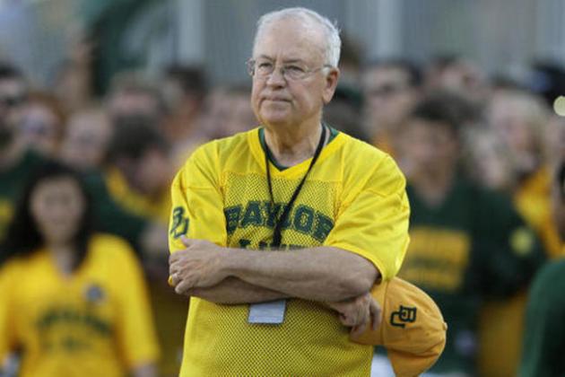 FILE - In the Sept. 12, 2015, file photo, Baylor President Ken Starr waits to run onto the field before an NCAA college football game in Waco, Texas. The former Baylor president is resigning his post as a law school professor, severing ties with the faith-based campus still reeling from a sexual assault scandal. Baylor said in a statement Friday, Aug. 19, 2016, that Starr