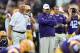 BATON ROUGE, LA - SEPTEMBER 27: ( L to R ) Offensive coordinator Cam Cameron and head coach Les Miles of the LSU Tigers watch action prior to a game against the New Mexico State Aggies at Tiger Stadium on September 27, 2014 in Baton Rouge, Louisiana. LSU won the game 63-7. (Photo by Stacy Revere/Getty Images)