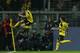 Dortmund's midfielder Andre Schuerrle (L) reacts after scoring during the UEFA Champions League first leg football match between Borussia Dortmund and Real Madrid at BVB stadium in Dortmund, on September 27, 2016. / AFP / Odd ANDERSEN (Photo credit should read ODD ANDERSEN/AFP/Getty Images)