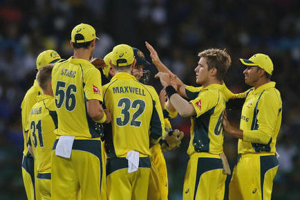 Australia's Adam Zampa, second right, celebrates the wicket of Sri Lanka's Thisara Perera with teammates during their second Twenty20 cricket match in Colombo, Sri Lanka, Friday, Sept. 9, 2016. (AP Photo/Eranga Jayawardena)