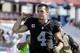 Oakland Raiders quarterback Derek Carr leaves the field after the Raiders beat the Tennessee Titans 17-10 in an NFL football game Sunday, Sept. 25, 2016, in Nashville, Tenn. (AP Photo/Weston Kenney)