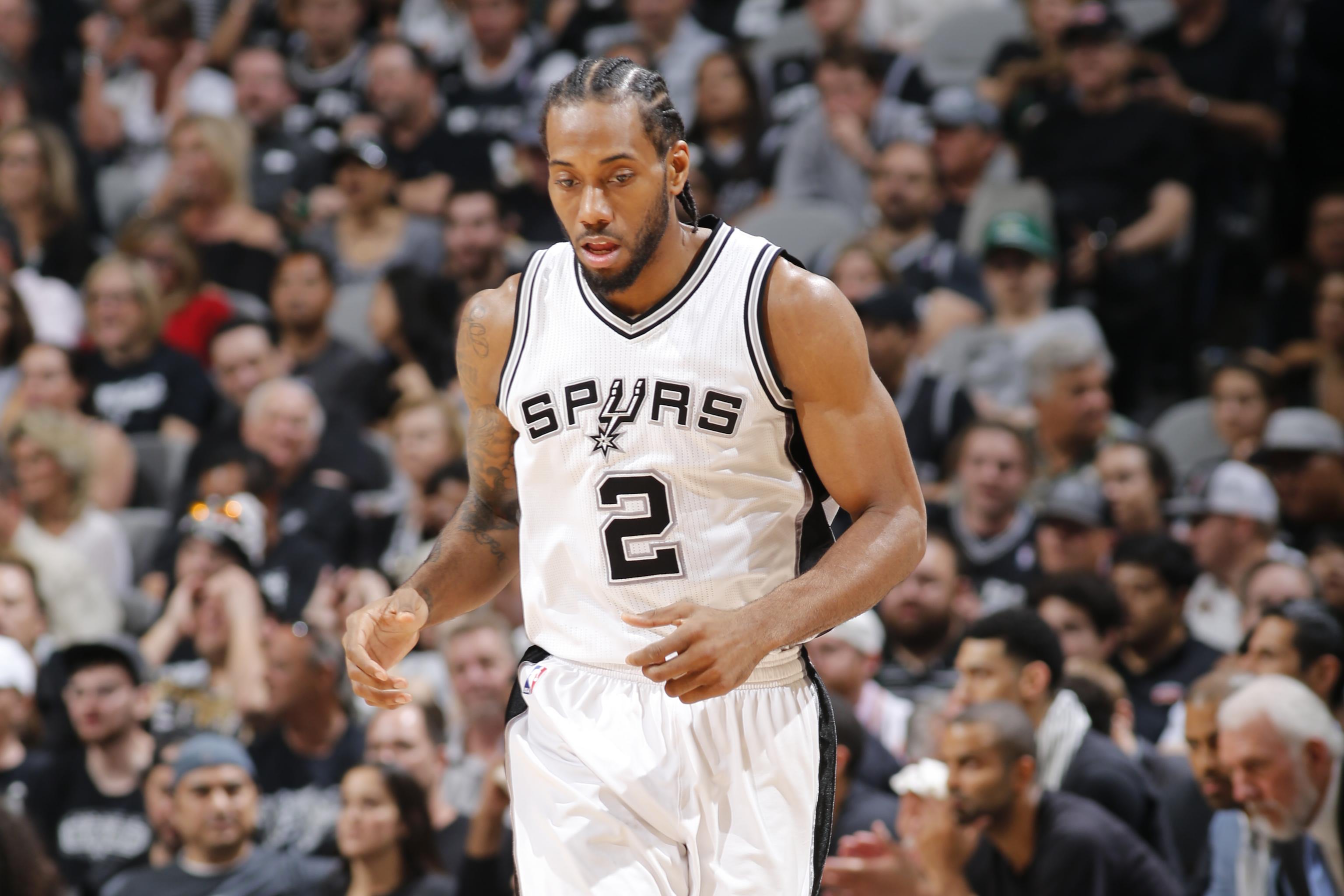 Tim Duncan not with Spurs in Orlando; focusing on Aldridge