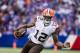 ORCHARD PARK, NY - NOVEMBER 30: Josh Gordon #12 of the Cleveland Browns carries the ball against the Buffalo Bills on November 30, 2014 at Ralph Wilson Stadium in Orchard Park, New York. Buffalo defeats Cleveland 26-10. (Photo by Brett Carlsen/Getty Images)