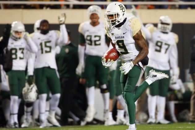 STILLWATER, OK - NOVEMBER 21:  KD Cannon #9 of the Baylor Bears pulls in a touchdown pass against the Oklahoma State Cowboys in the second half at Boone Pickens Stadium on November 21, 2015 in Stillwater, Oklahoma.  (Photo by Tom Pennington/Getty Images)