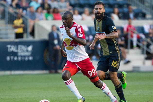 Jun 29, 2016; Philadelphia, PA, USA; New York Red Bulls forward Bradley Wright-Phillips (99) controls the ball past Philadelphia Union defender Richie Marquez (16) during the first half at Talen Energy Stadium. Mandatory Credit: Bill Streicher-USA TODAY Sports