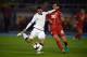 Italy's midfielder Giacomo Bonaventura (L) vies with Macedonia's midfielder Stefan Spirovski (R) during the FIFA World Cup 2018 qualifying football match between Macedonia and Italy on October 9, 2016 at Philip II of Macedon stadium in Skopje. / AFP / DIMITAR DILKOFF (Photo credit should read DIMITAR DILKOFF/AFP/Getty Images)