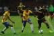 Brazil's Willian (C) vie for the ball with Venezuela's forward Salomon Rondon during their Russia 2018 World Cup football qualifier match in Merida, Venezuela, on October 11, 2016. / AFP / GEORGE CASTELLANOS (Photo credit should read GEORGE CASTELLANOS/AFP/Getty Images)