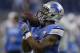 Detroit Lions running back Dwayne Washington runs through drills before the first half of an NFL football game against the Tennessee Titans, Sunday, Sept. 18, 2016, in Detroit. (AP Photo/Duane Burleson)
