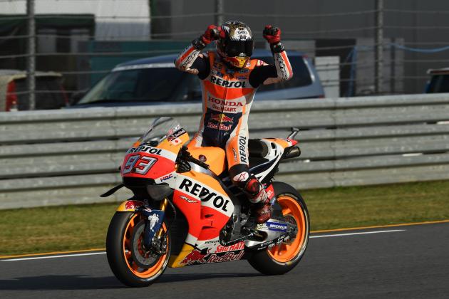 Repsol Honda Team's Spanish rider Marc Marquez celebrates his win at the MotoGP Japanese Grand Prix and for securing his third world championship title at the Twin Ring Motegi circuit in Motegi on October 16, 2016.
Marc Marquez secured his third world championship by winning the Japan Grand Prix Sunday where his closest rivals Yamaha duo Valentino Rossi and Jorge Lorenzo both crashed out. / AFP / Toshifumi KITAMURA (Photo credit should read TOSHIFUMI KITAMURA/AFP/Getty Images)
