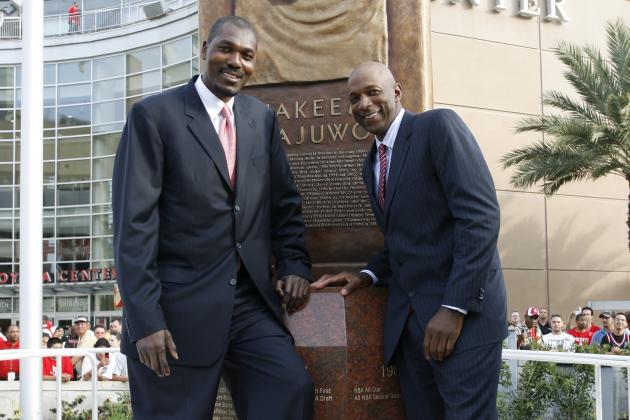 HOUSTON - APRIL 11:  NBA Legend and Hall of Fame inductee Hakeem Olajuwon (L) stands with former teammate Clyde Drexler of the Houston Rockets and the University of Houston after his monument unveiling ceremony before the game at the Toyota Center April 11, 2008 in Houston, Texas. NOTE TO USER: User expressly acknowledges and agrees that, by downloading and or using this Photograph, user is consenting to the terms and conditions of the Getty Images License Agreement. Mandatory Copyright Notice: Copyright 2008 NBAE (Photo by Bill Baptist/NBAE via Getty Images)
