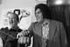 Heavyweight boxer Chuck Wepner, left, Compares fists with Andre
