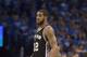OKLAHOMA CITY, OK - MAY 12: LaMarcus Aldridge #12 of the San Antonio Spurs pauses as he watches game action against the Oklahoma City Thunder during the second half of Game Six of the Western Conference Semifinals during the 2016 NBA Playoffs at the Chesapeake Energy Arena on May 12, 2016 in Oklahoma City, Oklahoma. NOTE TO USER: User expressly acknowledges and agrees that, by downloading and or using this photograph, User is consenting to the terms and conditions of the Getty Images License Agreement. (Photo by J Pat Carter/Getty Images)