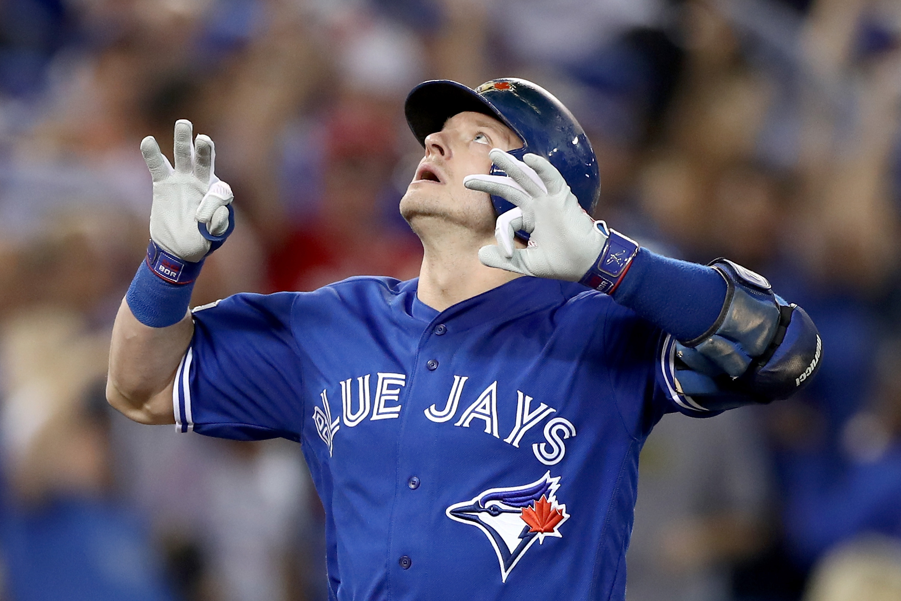 Josh Donaldson #20 of the Toronto Blue Jays reacts as he is