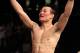 FAIRFAX, VA - MAY 15: 'The Korean Zombie' Chan Sung Jung reacts after defeating Dustin Poirier in a featherweight bout during the UFC on Fuel TV event at Patriot Center on May 15, 2012 in Fairfax, Virginia. (Photo by Josh Hedges/Zuffa LLC/Zuffa LLC via Getty Images)