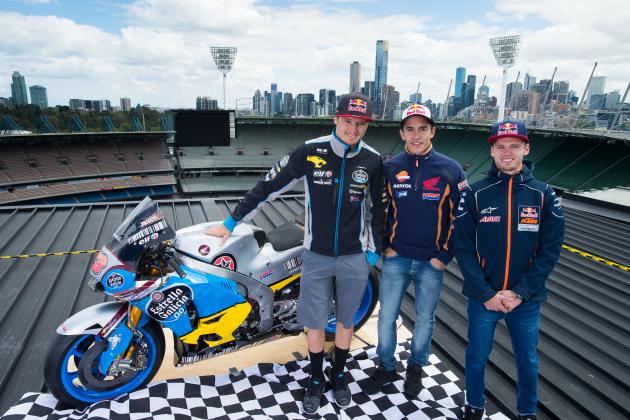 MELBOURNE, AUSTRALIA - OCTOBER 19:  In this handout image provided by the Australian Grand Prix Corporation, MotoGP riders Marc Marquez and Jack Miller and Moto3 rider Brad Binder pose on top of the Melbourne Cricket Ground on October 19, 2016 in Melbourne, Australia. (Photo by David Goudie/Australian Grand Prix Corporation via Getty Images)